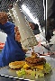 Мясник в фастфудной лавке Мясник в фастфудной лавке